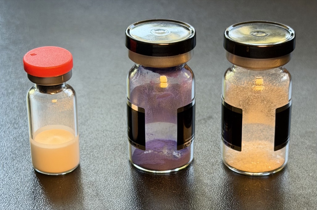 A standard china peptide vial next to two pharmaceutical grade Temple Research Labs vials